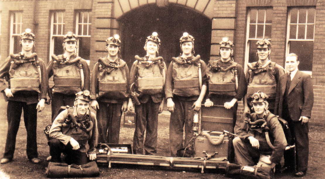 Richard Young kneeling at right in Collier Rescue Team